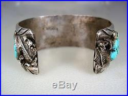 BIG HEAVY OLD NAVAJO STERLING SILVER & 9 TURQUOISE ROW BRACELET signed