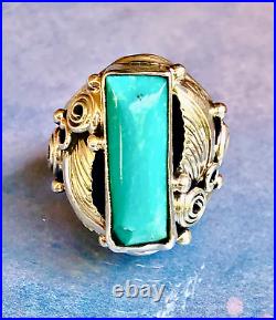 Signed Navajo Ring with Tooled Sterling Silver Leaves and Turquoise. Size 6.25