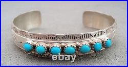 Vintage Signed NAVAJO 7 Turquoise & STERLING Silver Stamped CUFF BRACELET Yazzie